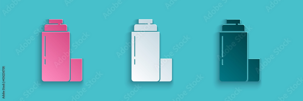 Paper cut Thermos container icon isolated on blue background. Thermo flask icon. Camping and hiking 