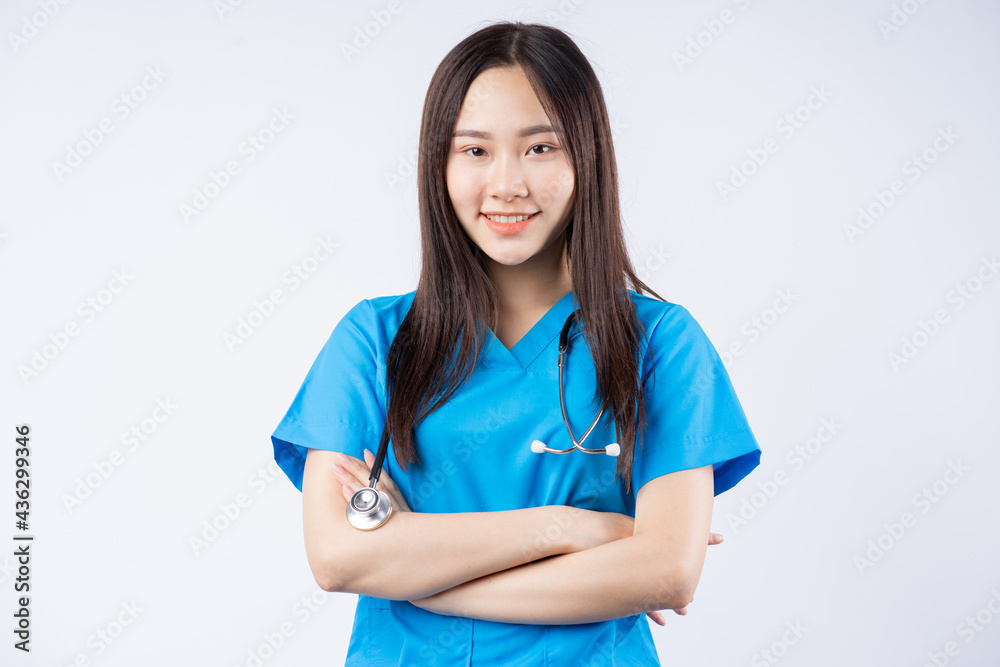 Portrait of an Asian nurse on a white background