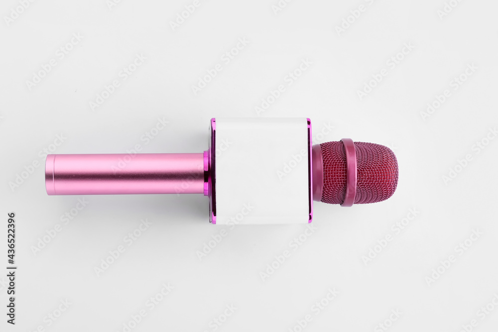 Modern microphone on white background