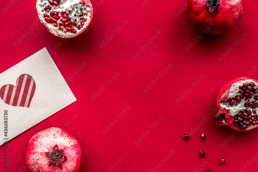 romantic dinner in red color with pomegranate and card top view mockup