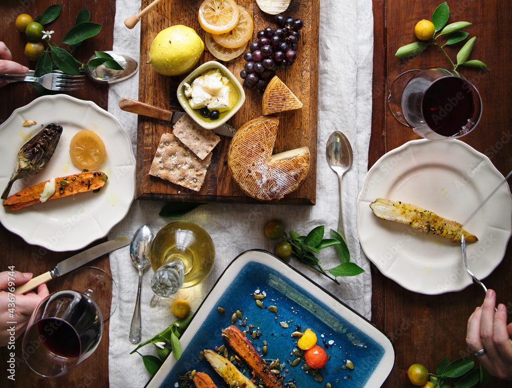 A couple eating a cheese platter food photography recipe idea