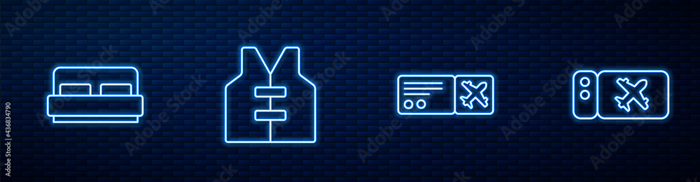 Set line Airline ticket, Hotel room bed, Life jacket and . Glowing neon icon on brick wall. Vector