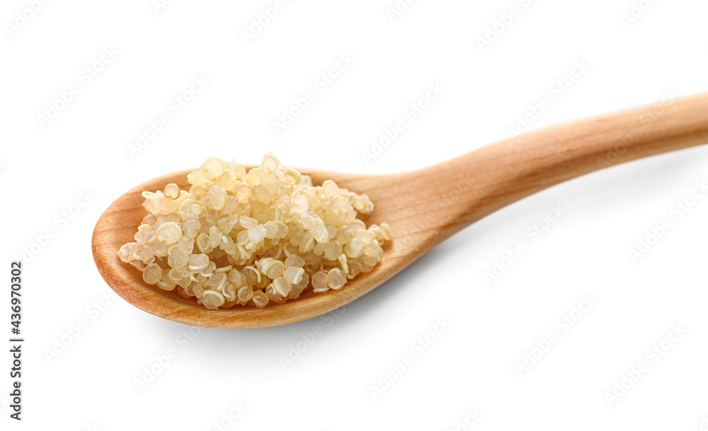 Tasty quinoa in spoon on white background