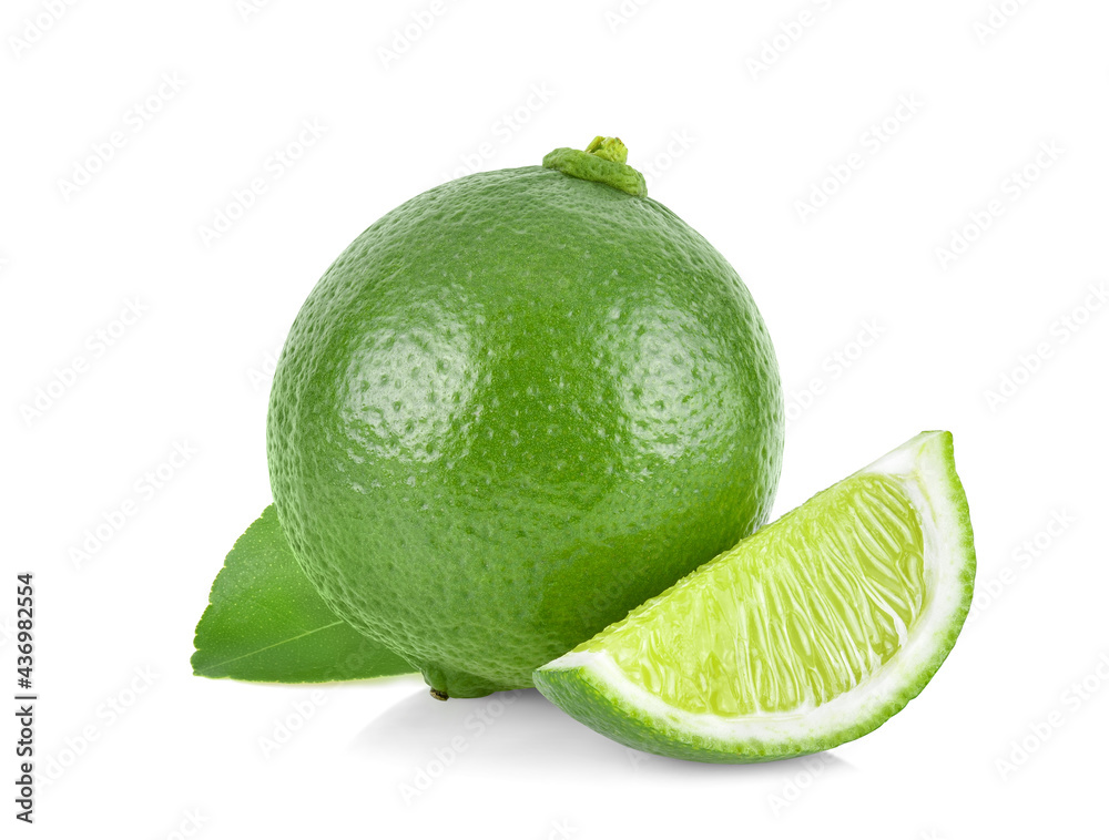 Limes with slices and leaves isolated on white background