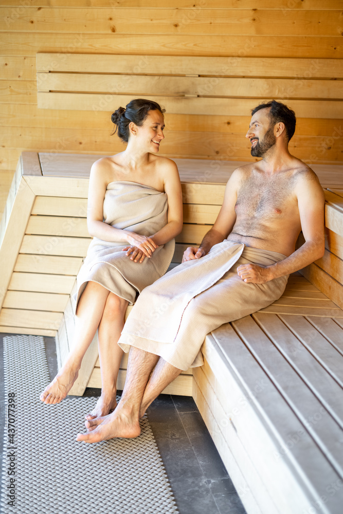 Adult caucasian couple resting in a sauna, having a child-free weekend in Spa