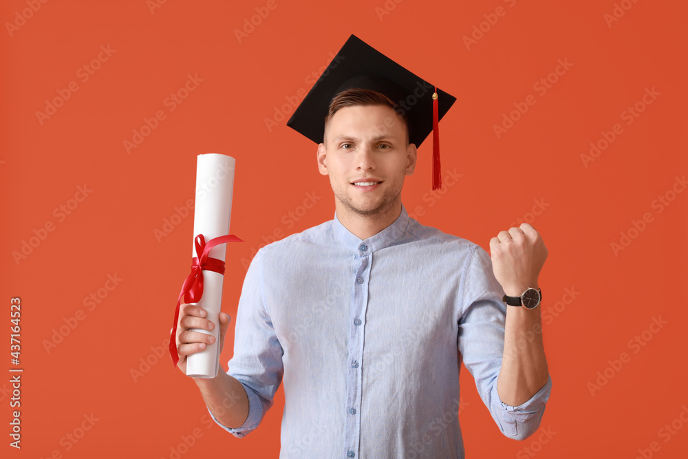 Happy graduating student on color background