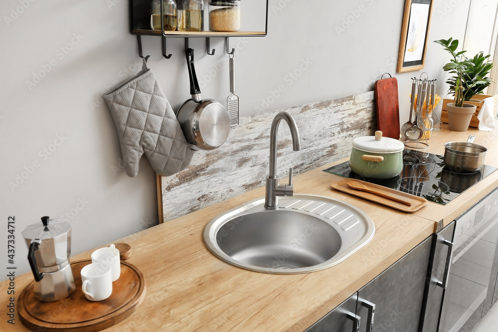 Sink in interior of modern kitchen