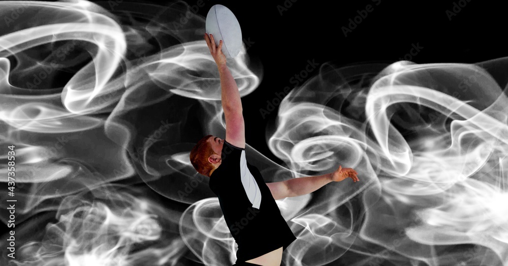 Compostion of caucasian rugby player holding ball on black background with white blur