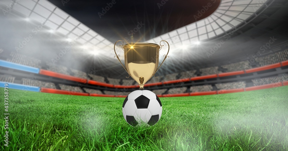 Compostion of cup and football over stadium and white blur