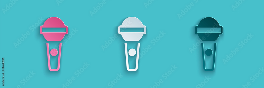 Paper cut Microphone icon isolated on blue background. On air radio mic microphone. Speaker sign. Pa