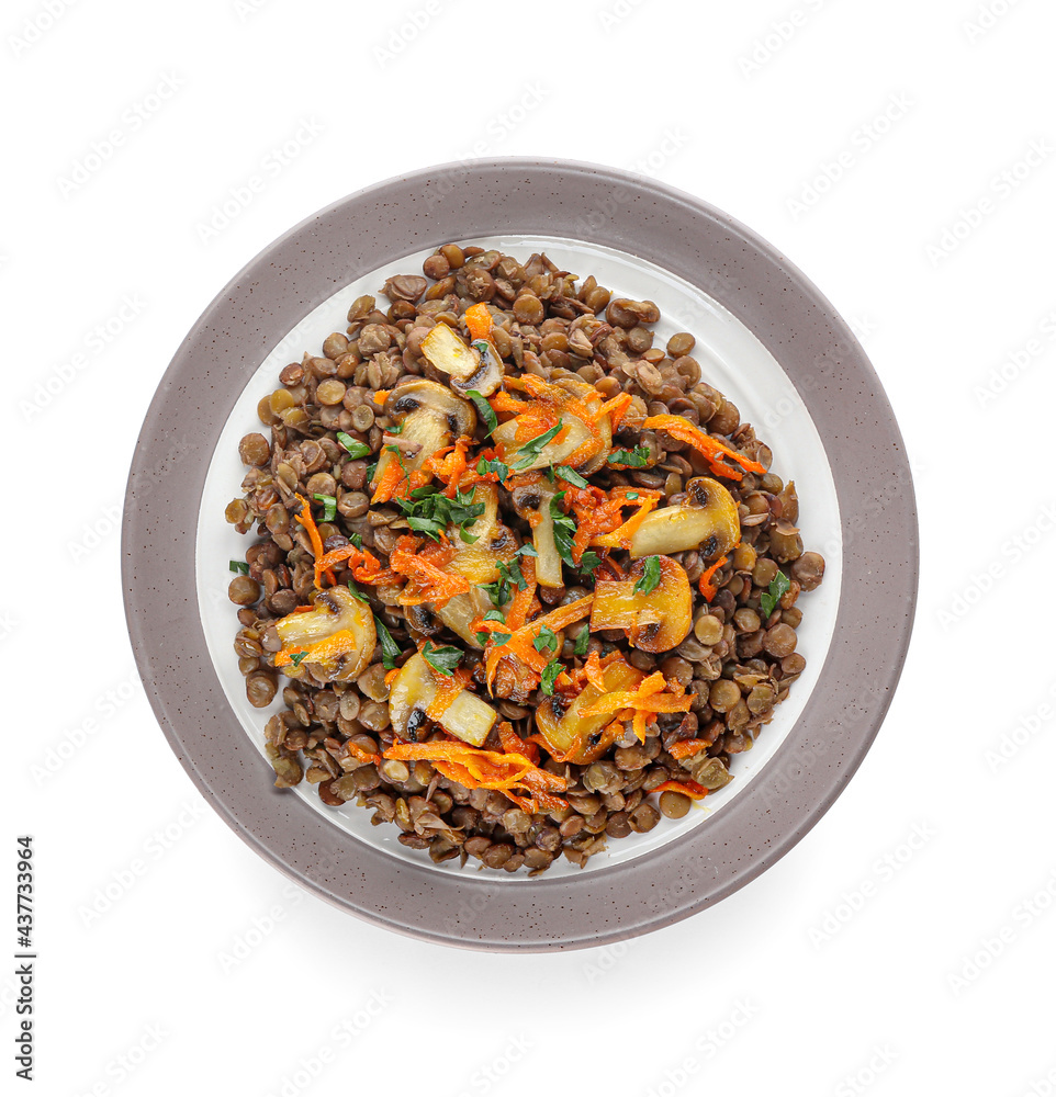 Plate with tasty cooked lentils and mushrooms on white background