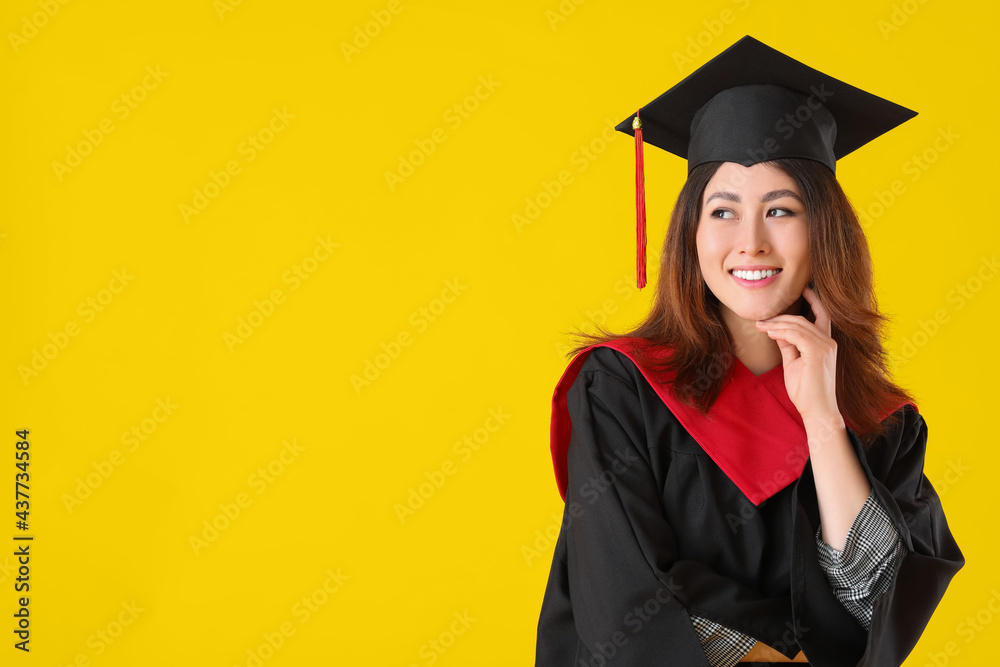 Female graduating student on color background