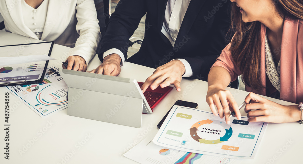 Businessman is in meeting discussion with colleague businesswomen in modern workplace office. People