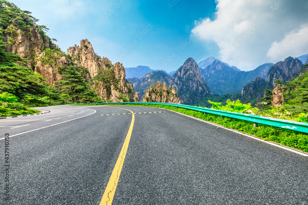 Mountain road natural landscape on a sunny day.