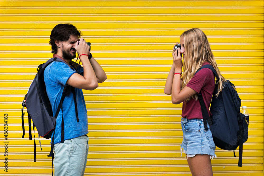 Couple taking photos of each other