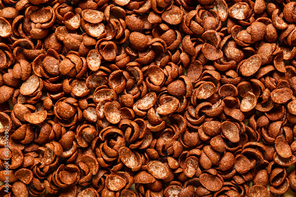 Chocolate corn flakes as background, closeup