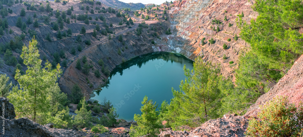 Ecosystem restoration. Reforestation in former open pit mine area, panoramic view