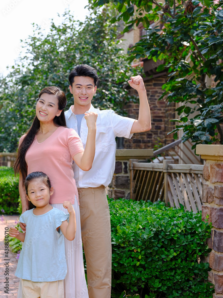 Happy family of three in the outdoor group photo