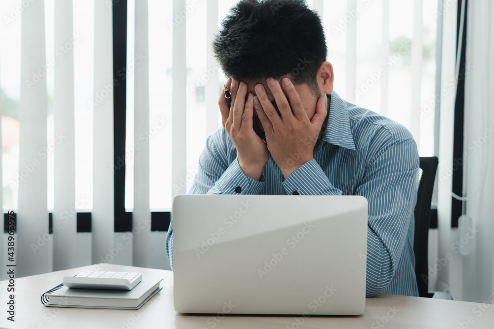 business man seriously working on computer laptop. He thinking find solution problem of work