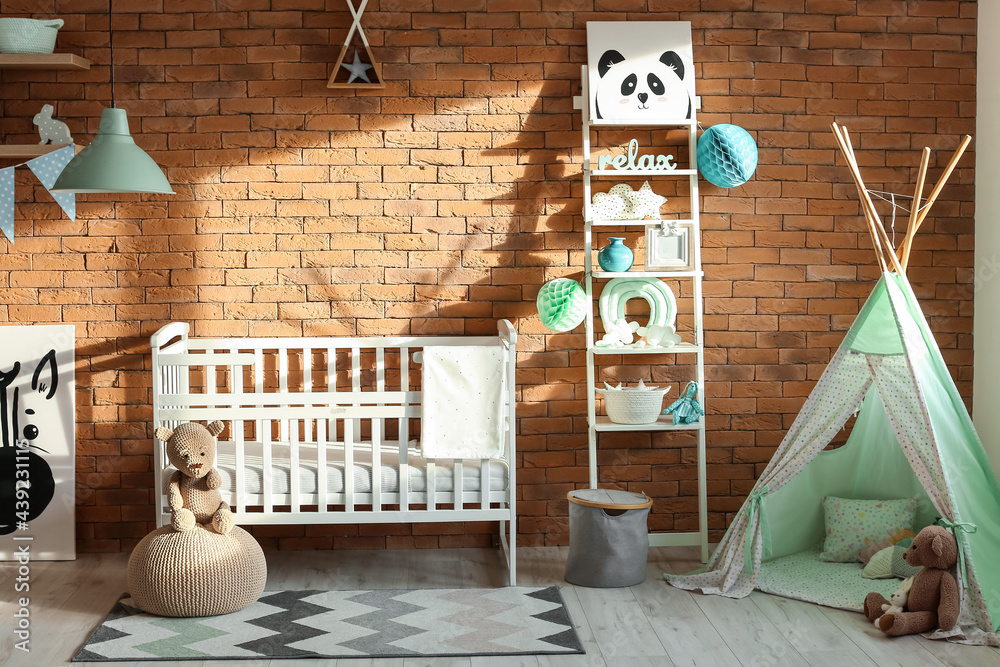 Interior of modern childrens room with comfortable baby bed