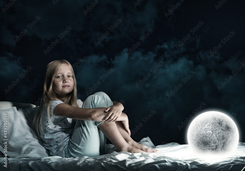 Girl in her bed and moon planet