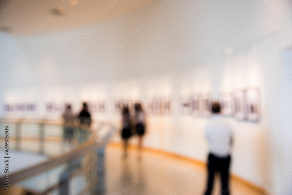 People enjoying an art exhibition