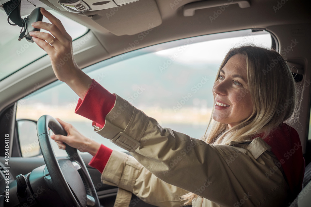 Young stylish woman driving car. Travel, Holidays, Journey, Trip, Lifestyle concept. Health care, au