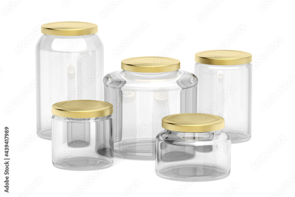 Group of empty glass jars with different sizes on white background