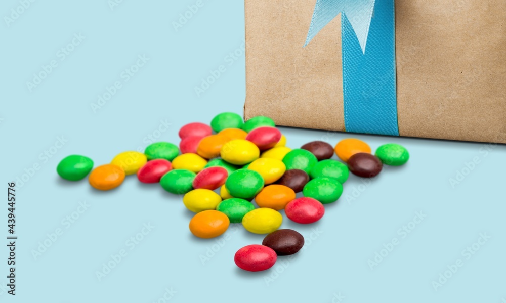 Various candy sweets. Valentines day gift box on a desk.