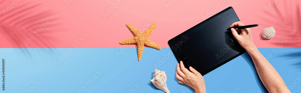 Graphic pen tablet with starfish and sea shells