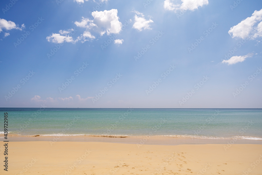 Empty tropical summer beach background Horizon with sky and white sand beach Wave crashing on sandy 