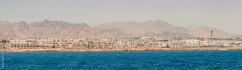 Sea view of rocky coast of the resort town of Sharm el Sheikh. Red Sea Egypt.