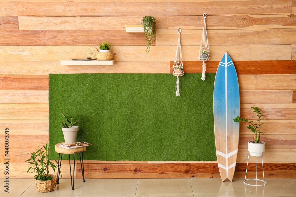 Interior of modern room with surfboard