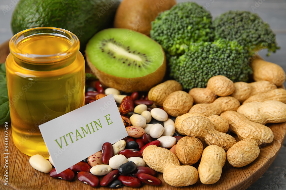 Plate with healthy products rich in vitamin E, closeup