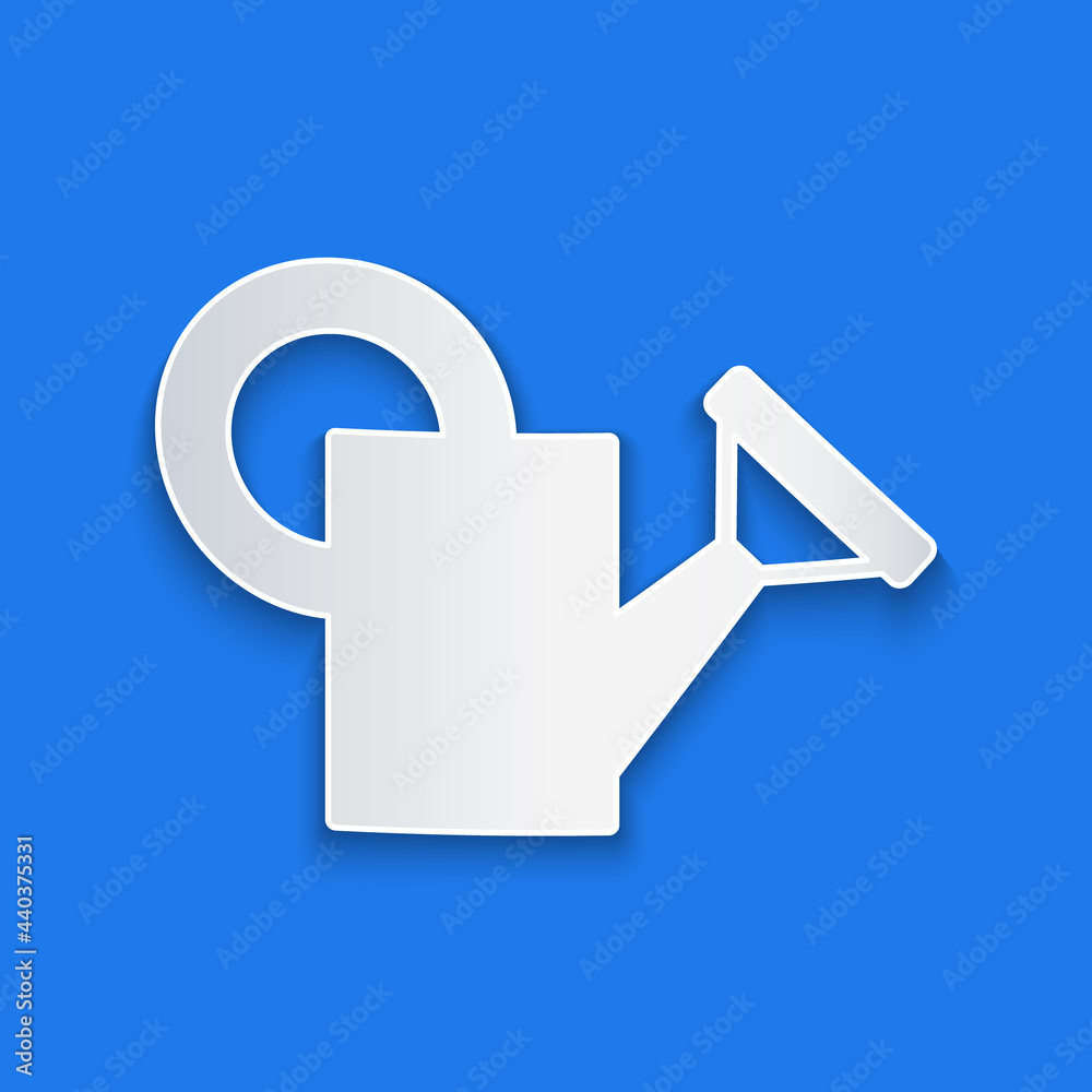 Paper cut Watering can icon isolated on blue background. Irrigation symbol. Paper art style. Vector