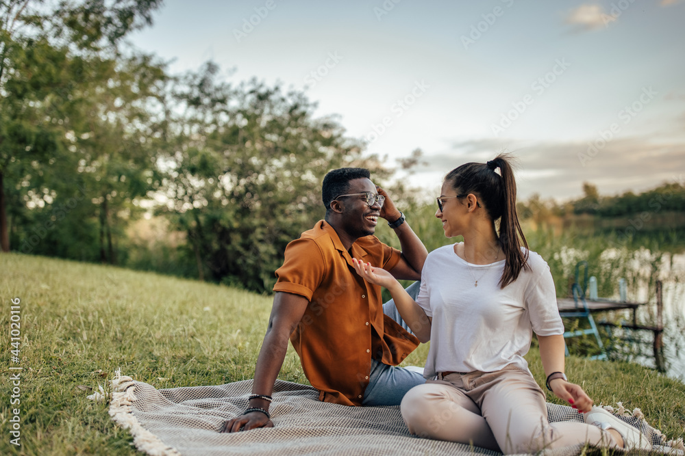 Adult couple, having a picnic, in the nature.