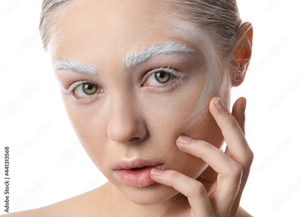 Beautiful young woman with dyed eyebrows on white background