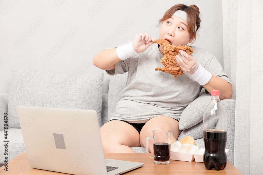 Asian fat girl sitting on the sofa