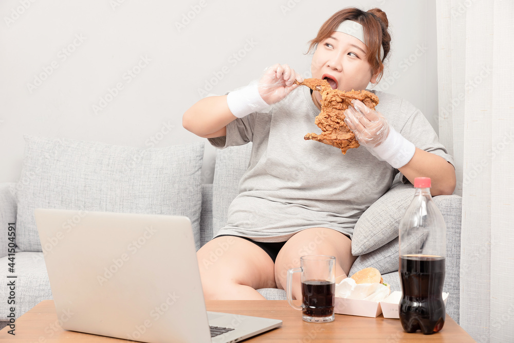 Asian fat girl sitting on the sofa