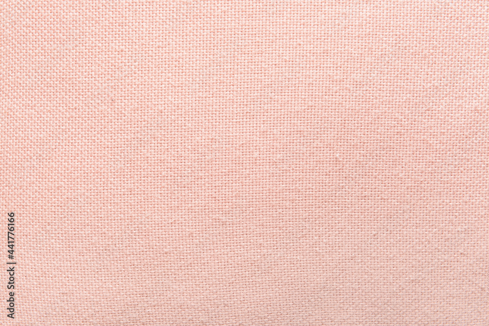 Texture of pink canvas fabric, closeup