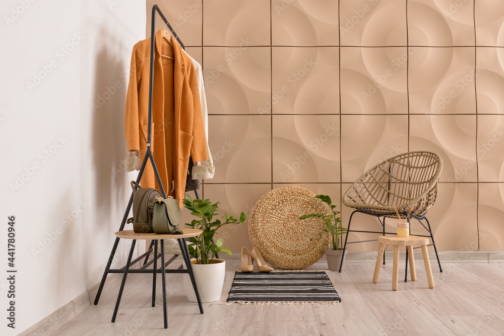 Interior of stylish hallway with rug