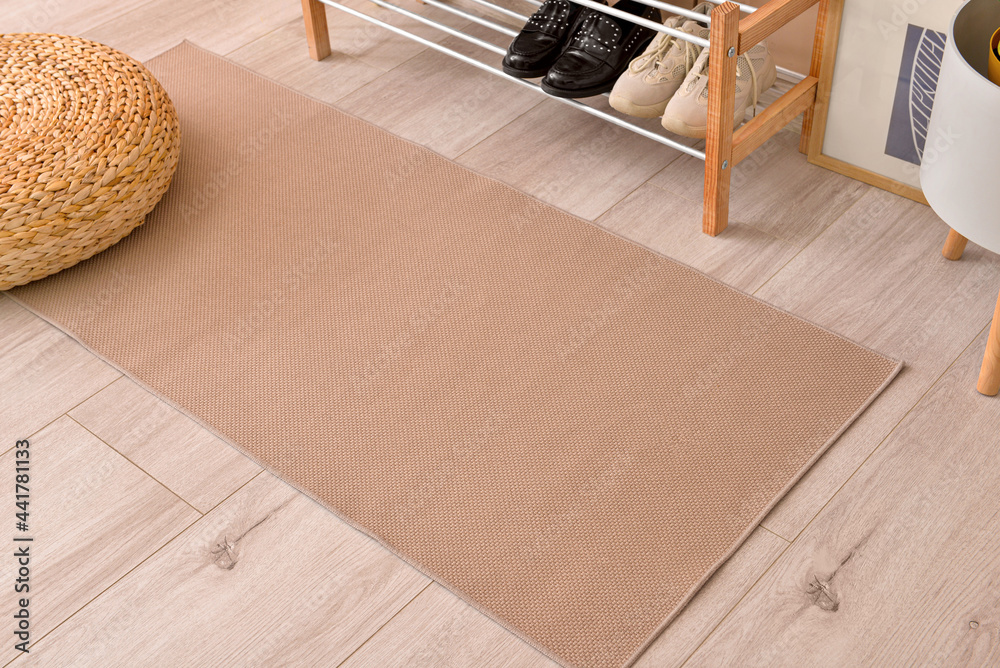 Stylish rug in interior of modern hallway