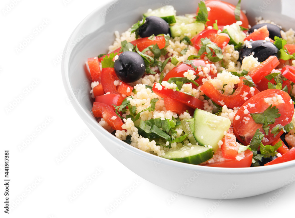 Bowl with couscous and vegetables on white background