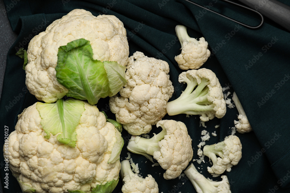 Cauliflower cabbages on fabric background