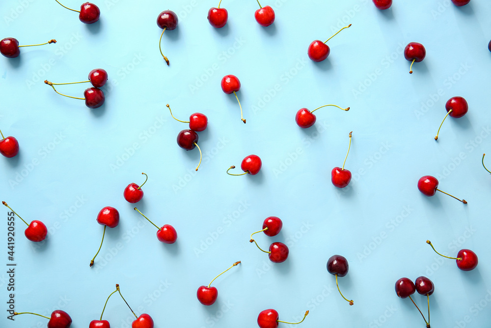 Tasty ripe cherry on color background