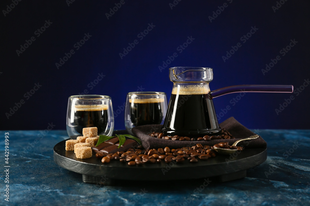 Composition with aromatic turkish coffee, sweets and beans on color background