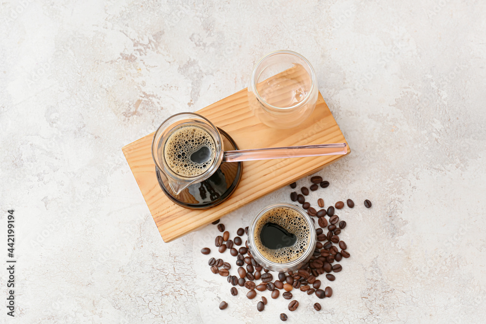 Composition with aromatic turkish coffee and beans on light background