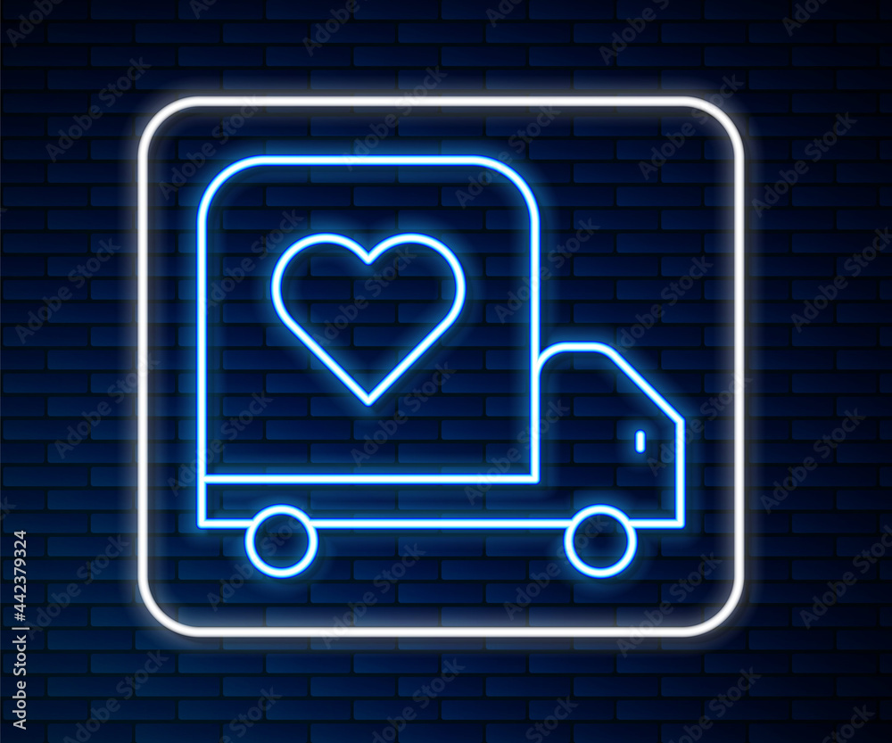 Glowing neon line Delivery truck with heart icon isolated on brick wall background. Love delivery tr