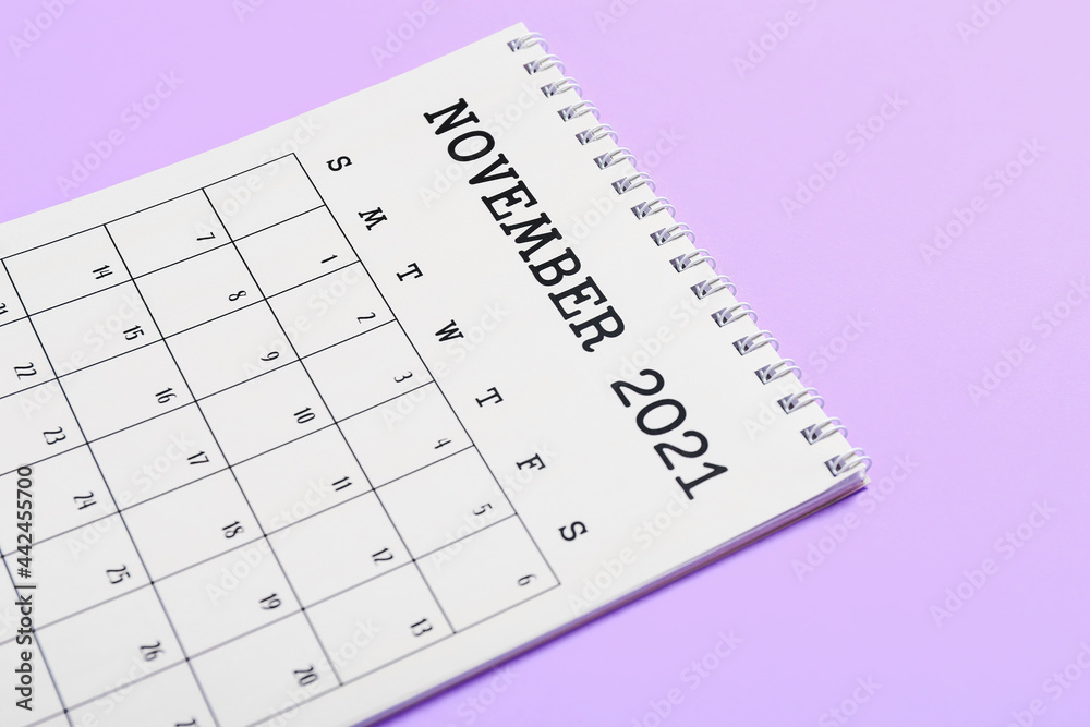 Flip paper calendar on color background