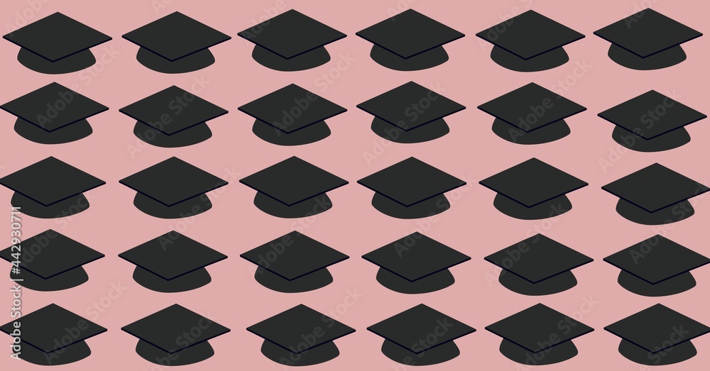 Composition of multiple graduation hats on purple background